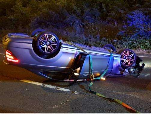 The car crash was between two vehicles and left this Mercedes on it's roof (3317859)