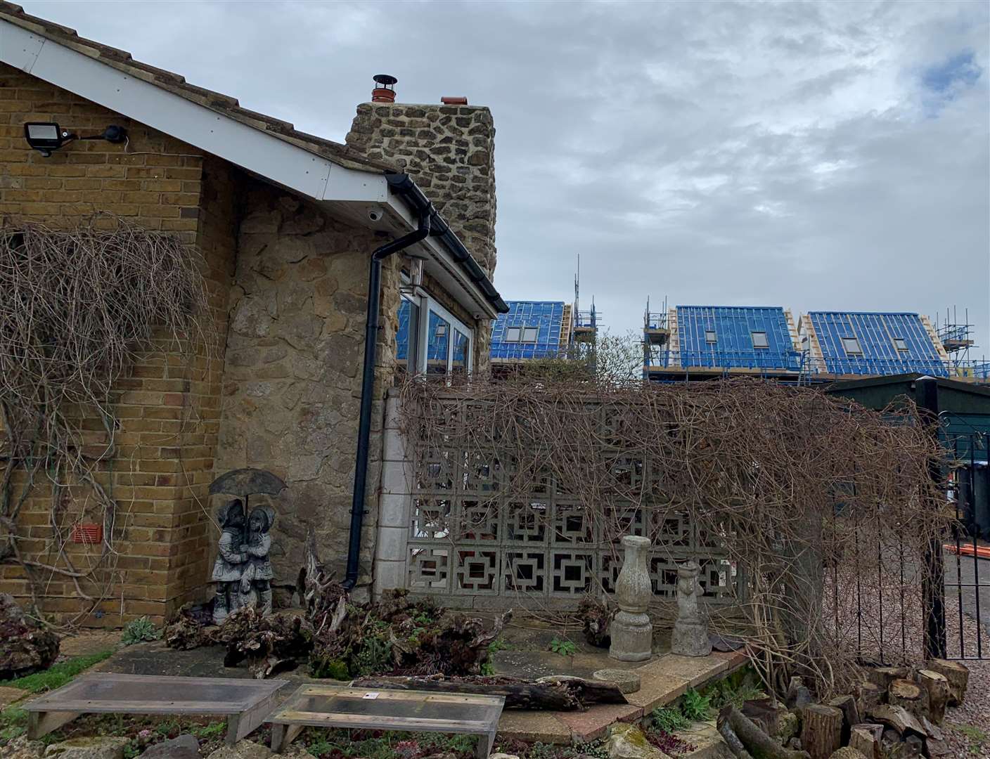 The new-builds loom over the homes in Shalloak Road in Broad Oak