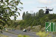 An air ambulance lands to take the male victim to a London hospital. Picture: Barry Crayford