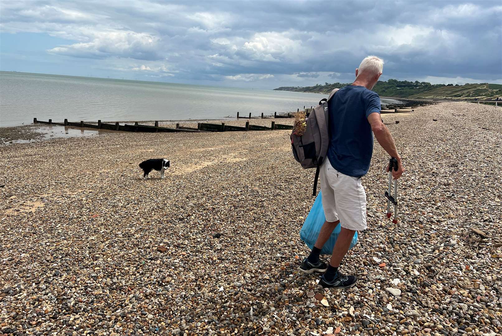 A litter picker along Minster Beach. Picture: Megan Carr