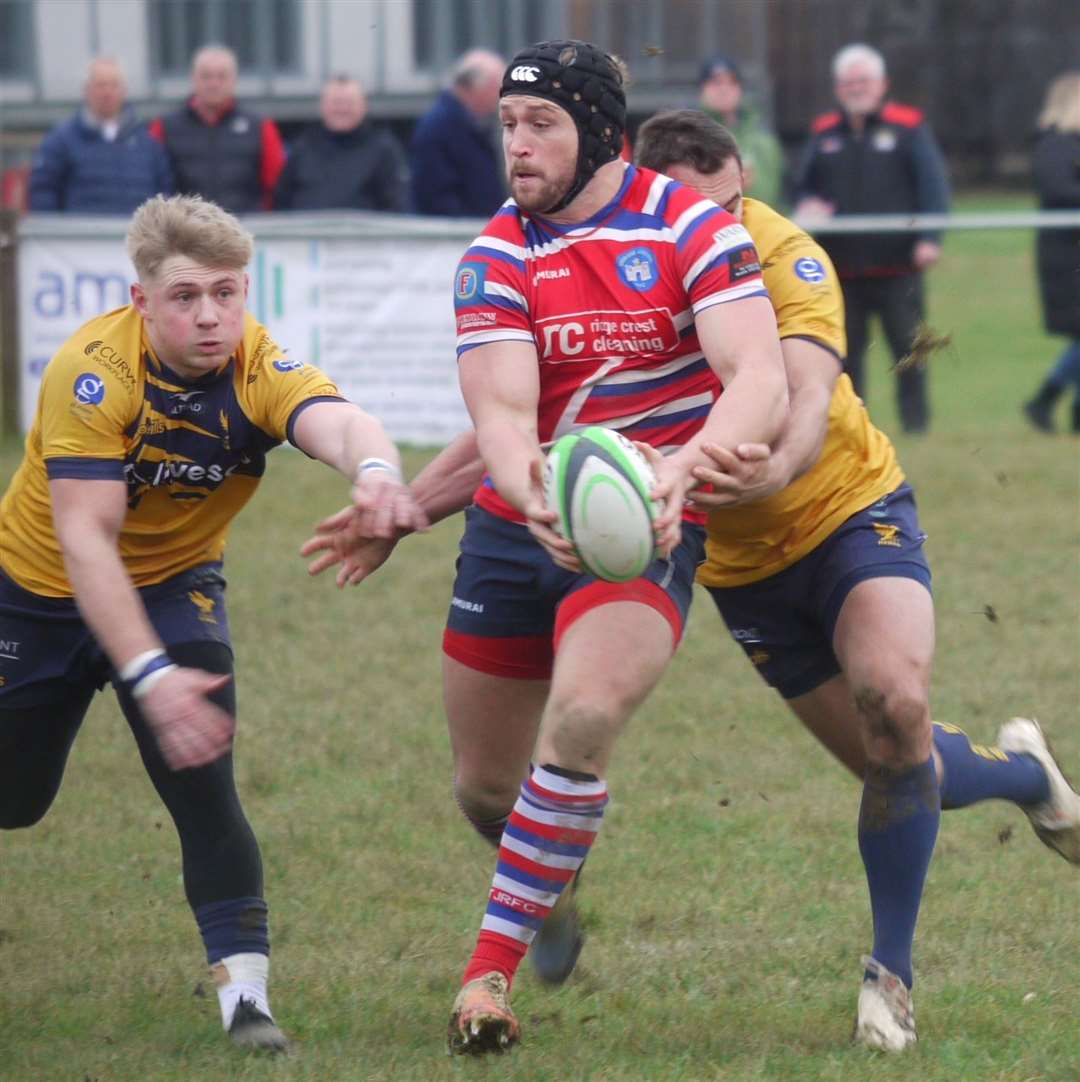 Duncan Tout takes on Henley for Tonbridge Juddians. Picture: Adam Hookway