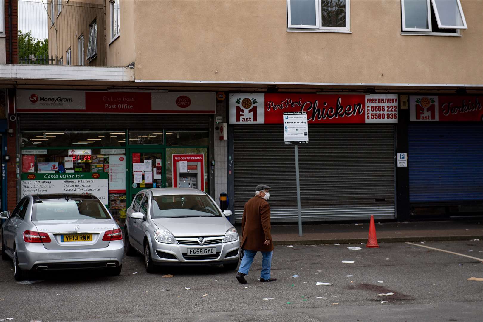 The scene outside West Cross Shopping Centre in Smethwick (Jacob King/PA)