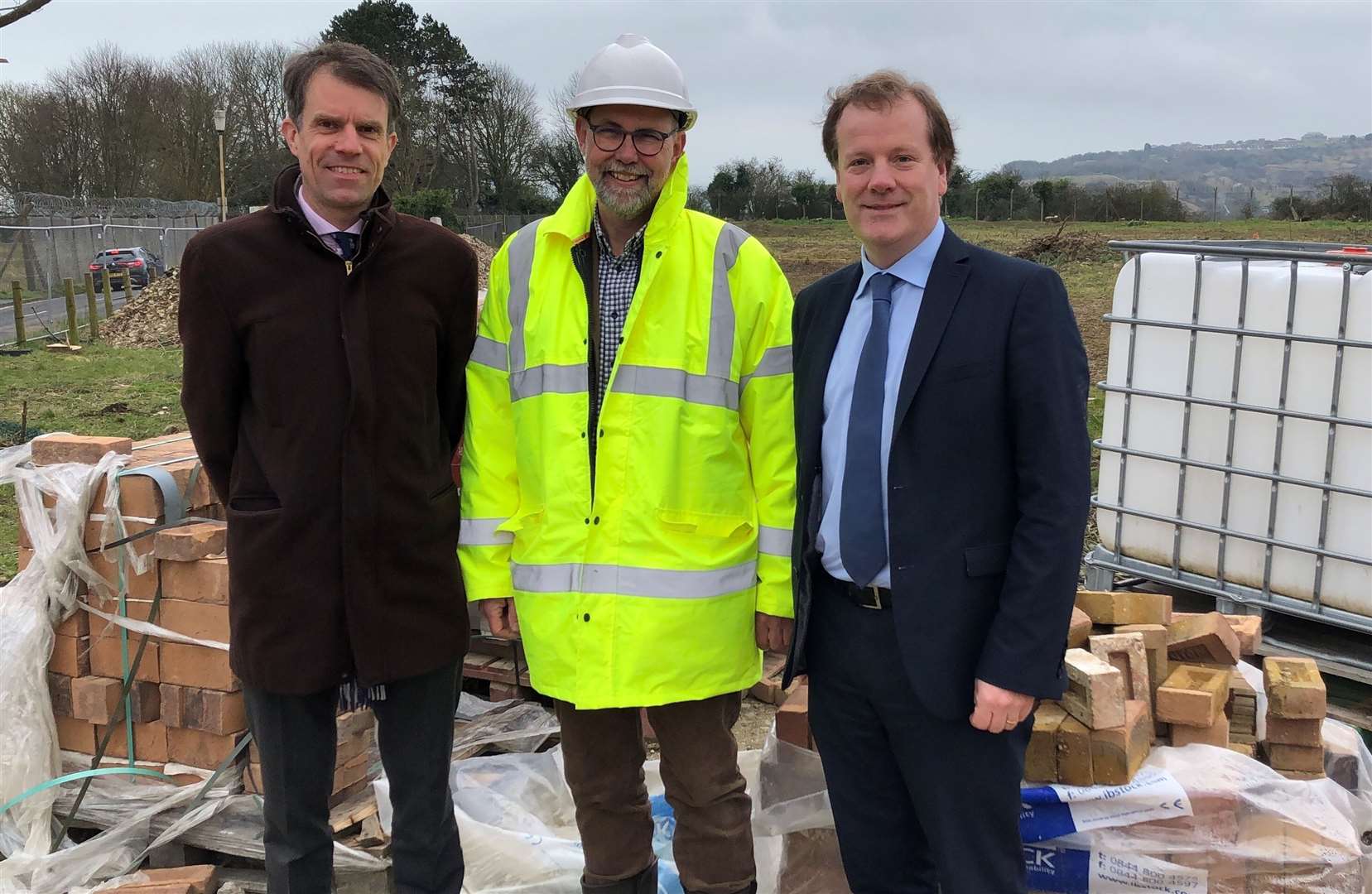 The Connaught Barracks site: Allert Riepma, of Homes England, Barrey Seeley, construction manager, and MP Charlie Elphicke