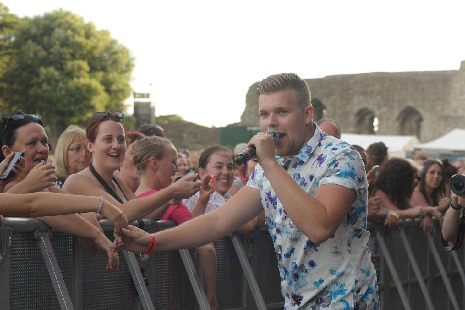 Jamie Johnson greets fans during his set