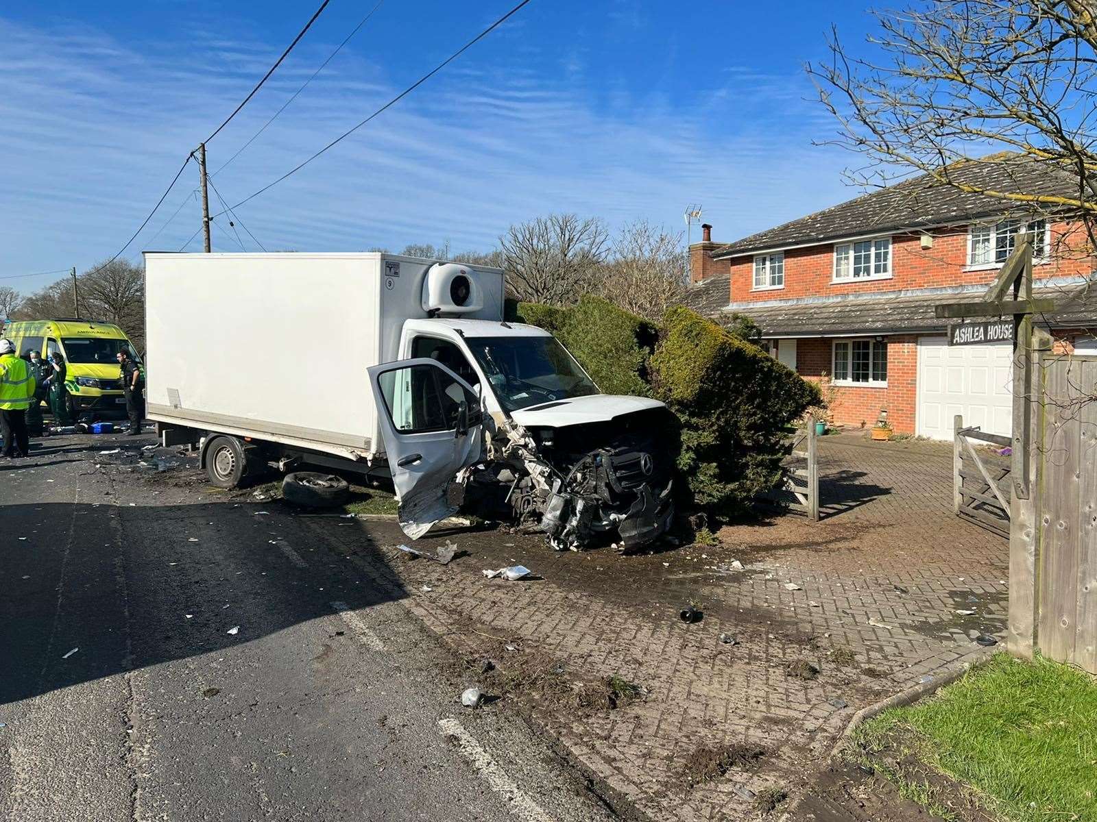 A van was severely damaged in the crash, while the driver was treated for minor injuries