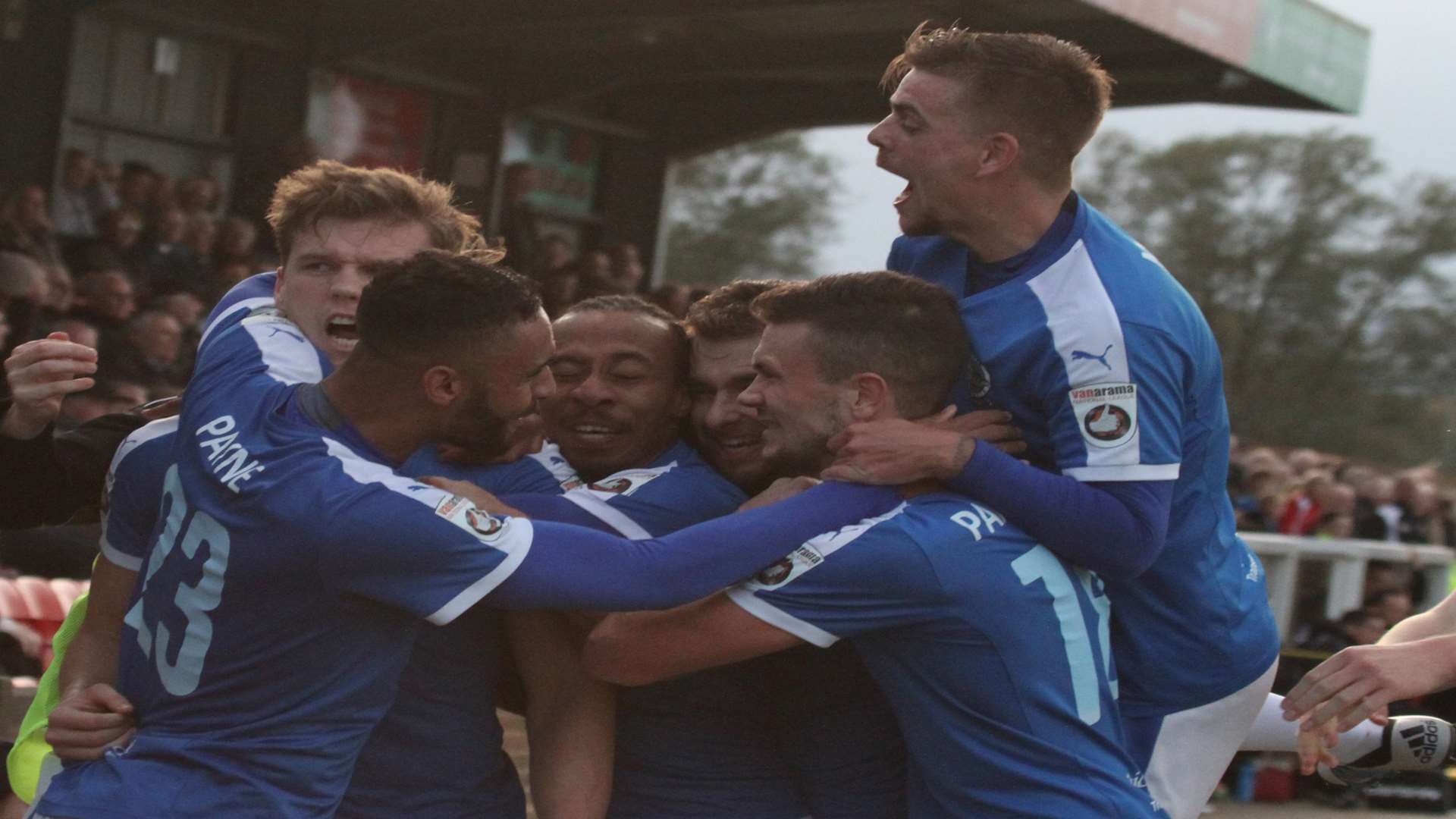 Sean Raggett is mobbed by his Dover team-mates after scoring the winner at Eastbourne Borough. Photo: Simon Harris