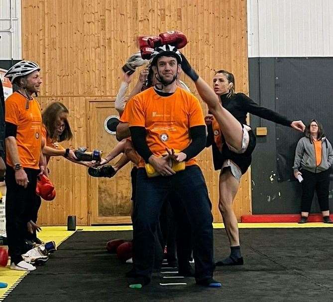 Maidstone boxer Nicola Ireland broke the Guinness World Record after kicking 64 gloves off a person's head in a minute. Picture: Nicola Ireland