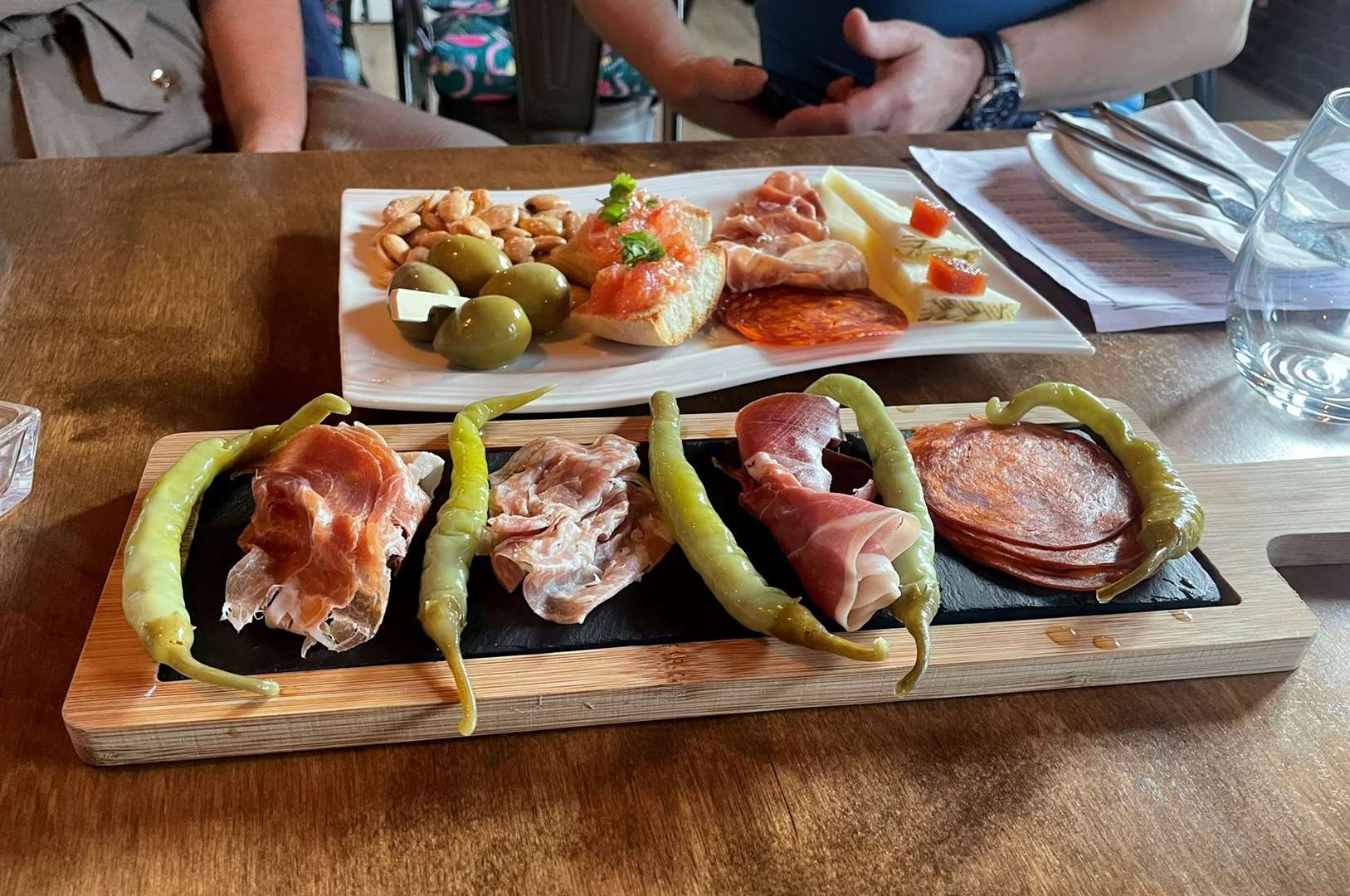 Cold Tapas dishes: Tabla Mixta (top) and Tabla de Embutidos, were served first