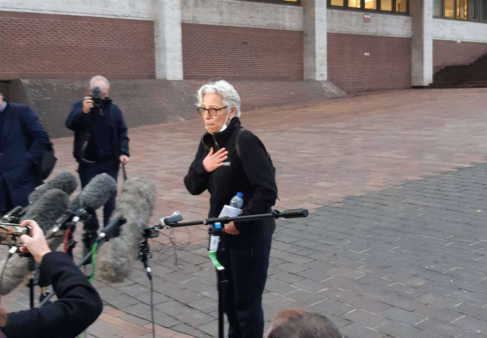 Nevres Kemal speaking outside court