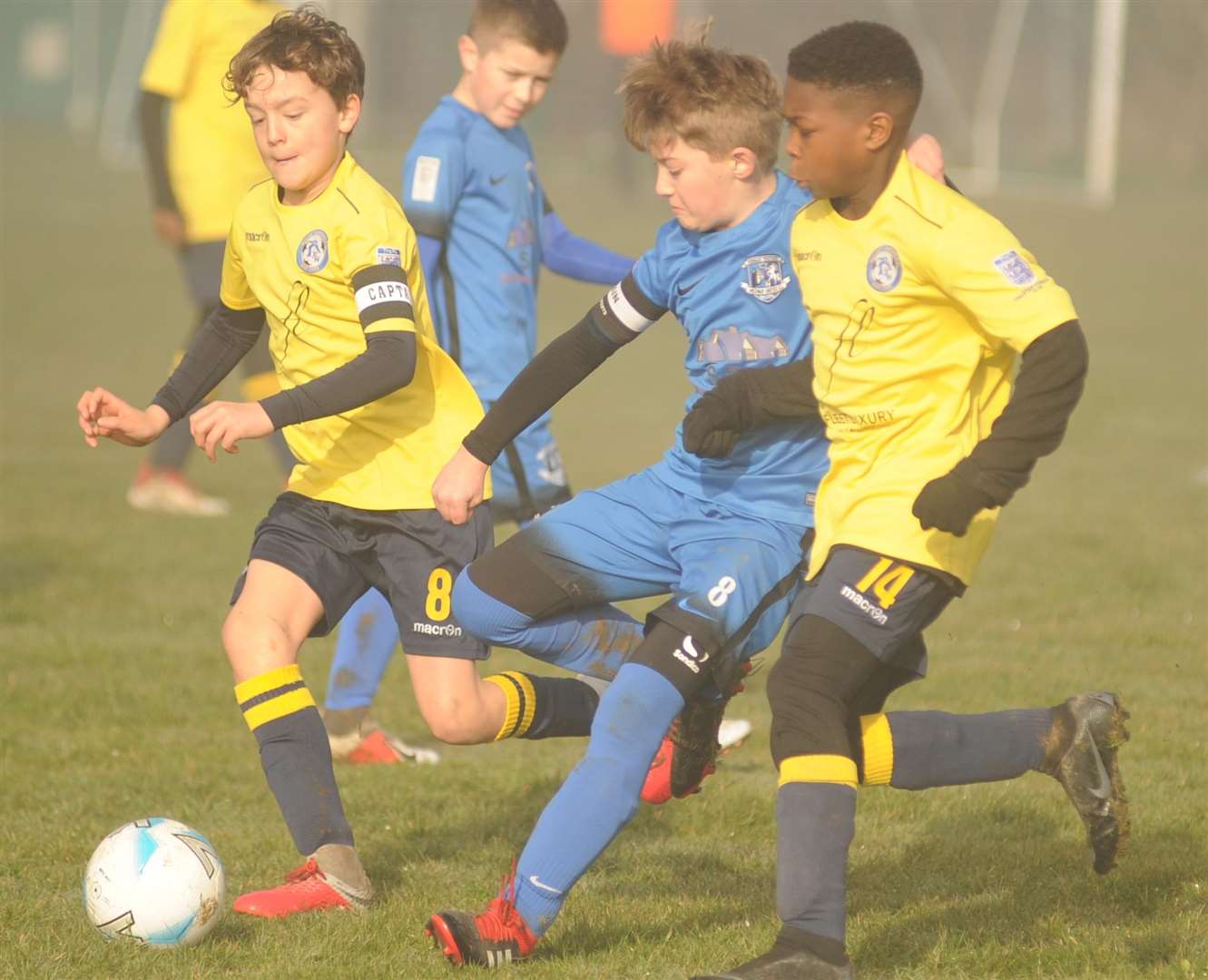 Medway United West under-11s (blue) take on Iwade Herons Colts under-11s Picture: Steve Crispe FM7393630