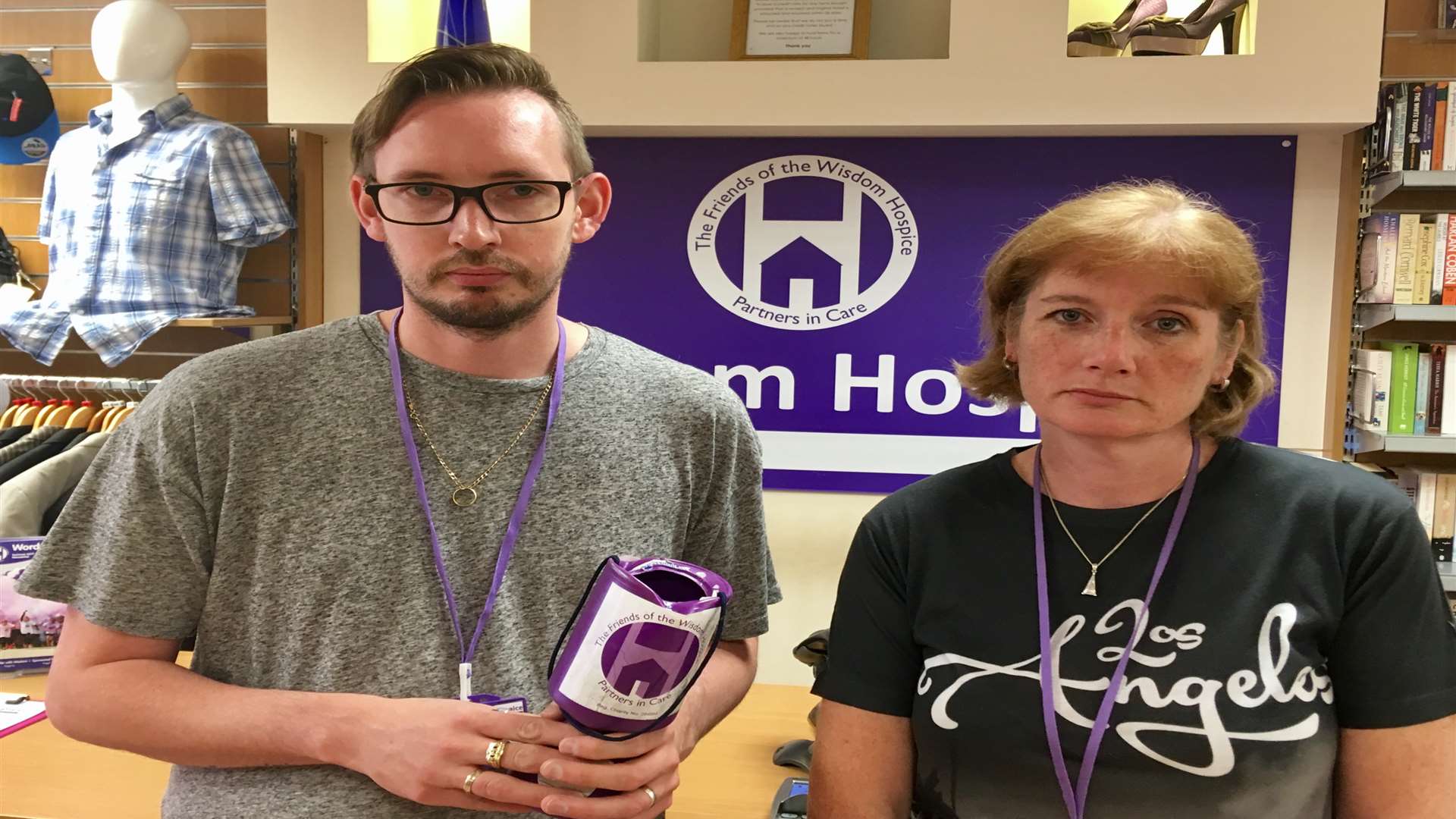 John Hale and Clare Miller at the shop with the broken charity tin.