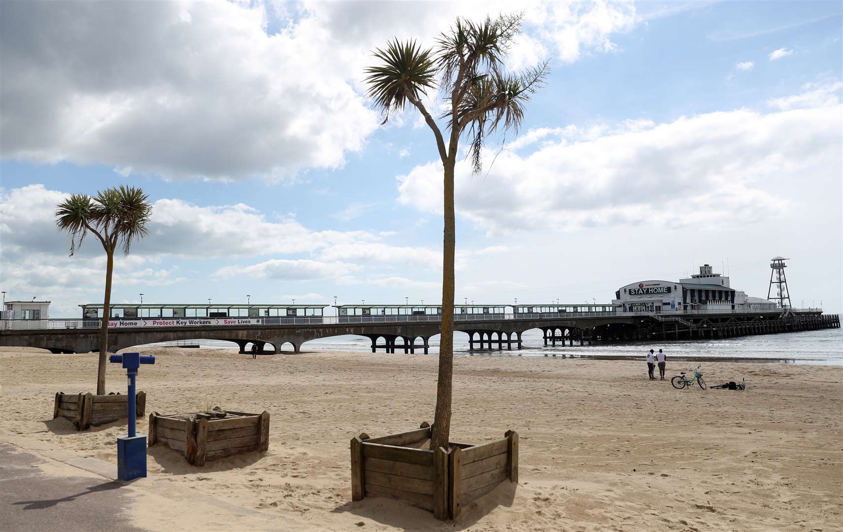 In contrast, just a handful of people could be spotted on Bournemouth beach, despite the nice weather (Andrew Matthews/PA)