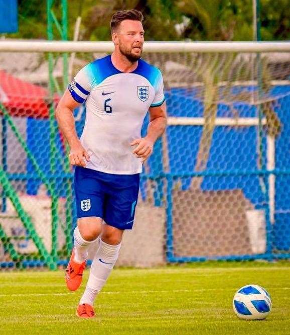 Defender Jamie Coyle in action for England Veterans as he skippered the side in a tournament-opening goalless draw against Australia