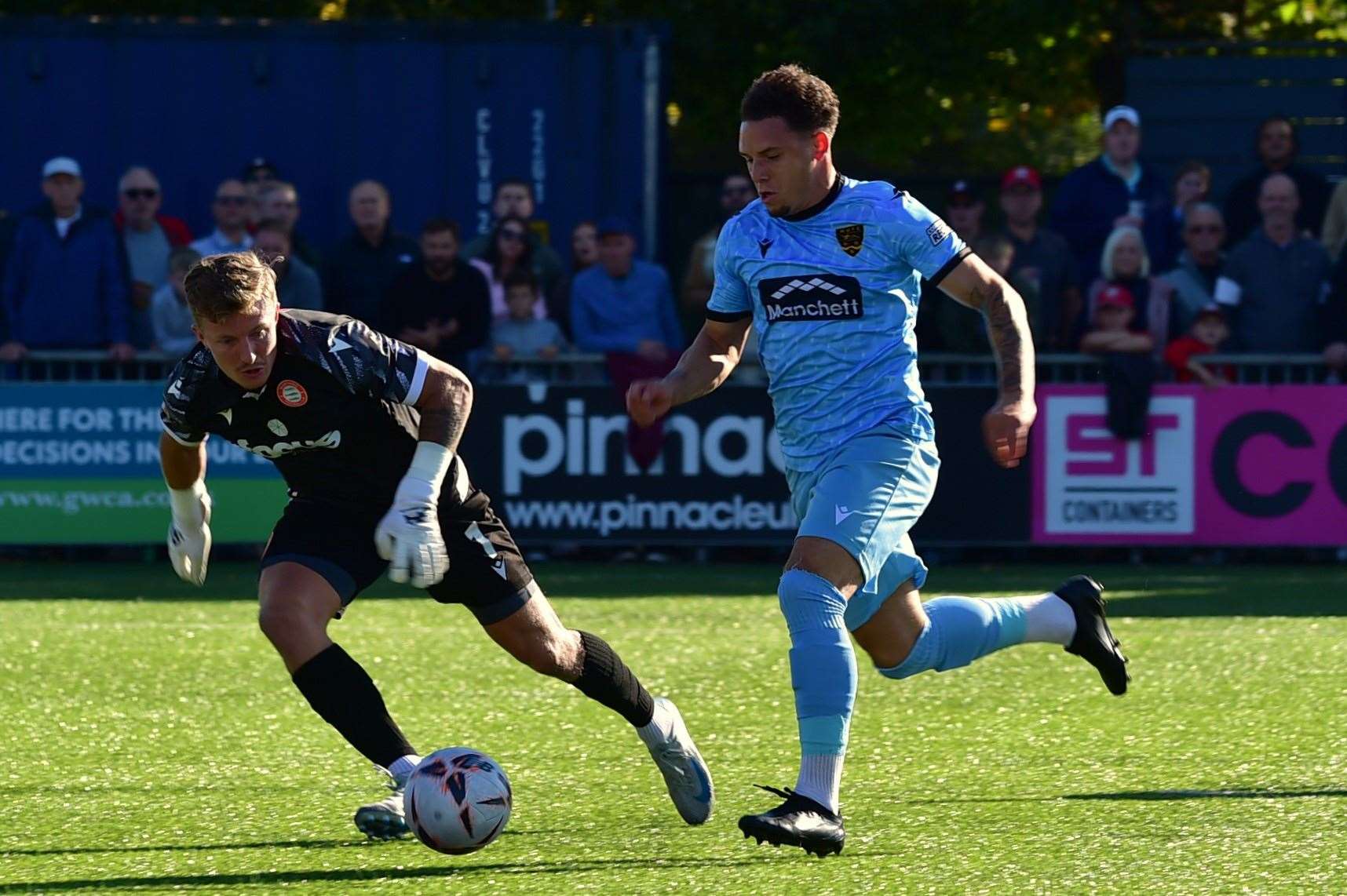 Charlie Seaman beats Chris Haigh to the ball to put Maidstone in front. Picture: Steve Terrell