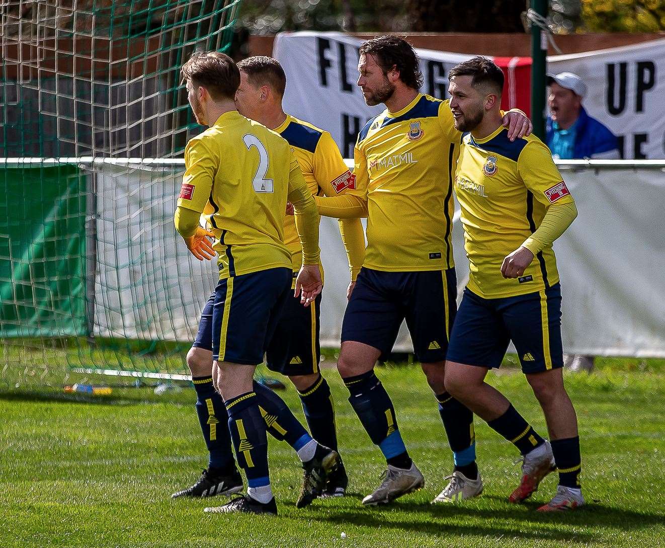 Whitstable celebrate midfielder Monger's goal. Picture: Les Biggs