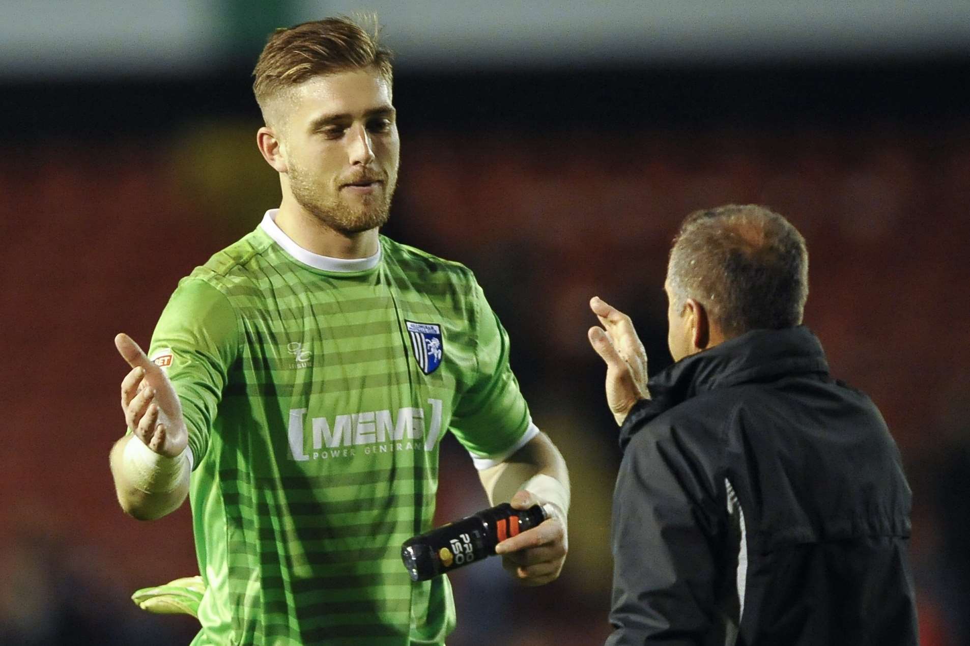 Keeper Tomas Holy celebrates three points with boss Steve Lovell Picture: Ady Kerry