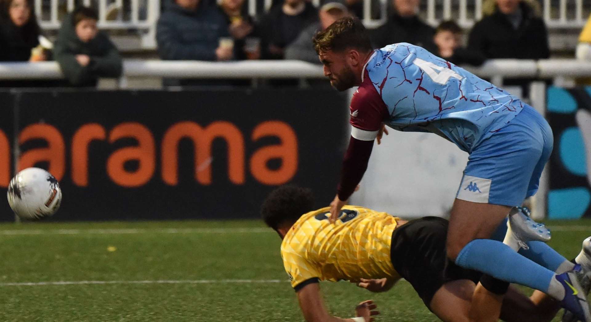 Maidstone win an early penalty as Sol Wanjau-Smith is fouled by Corey Panter. Picture: Steve Terrell