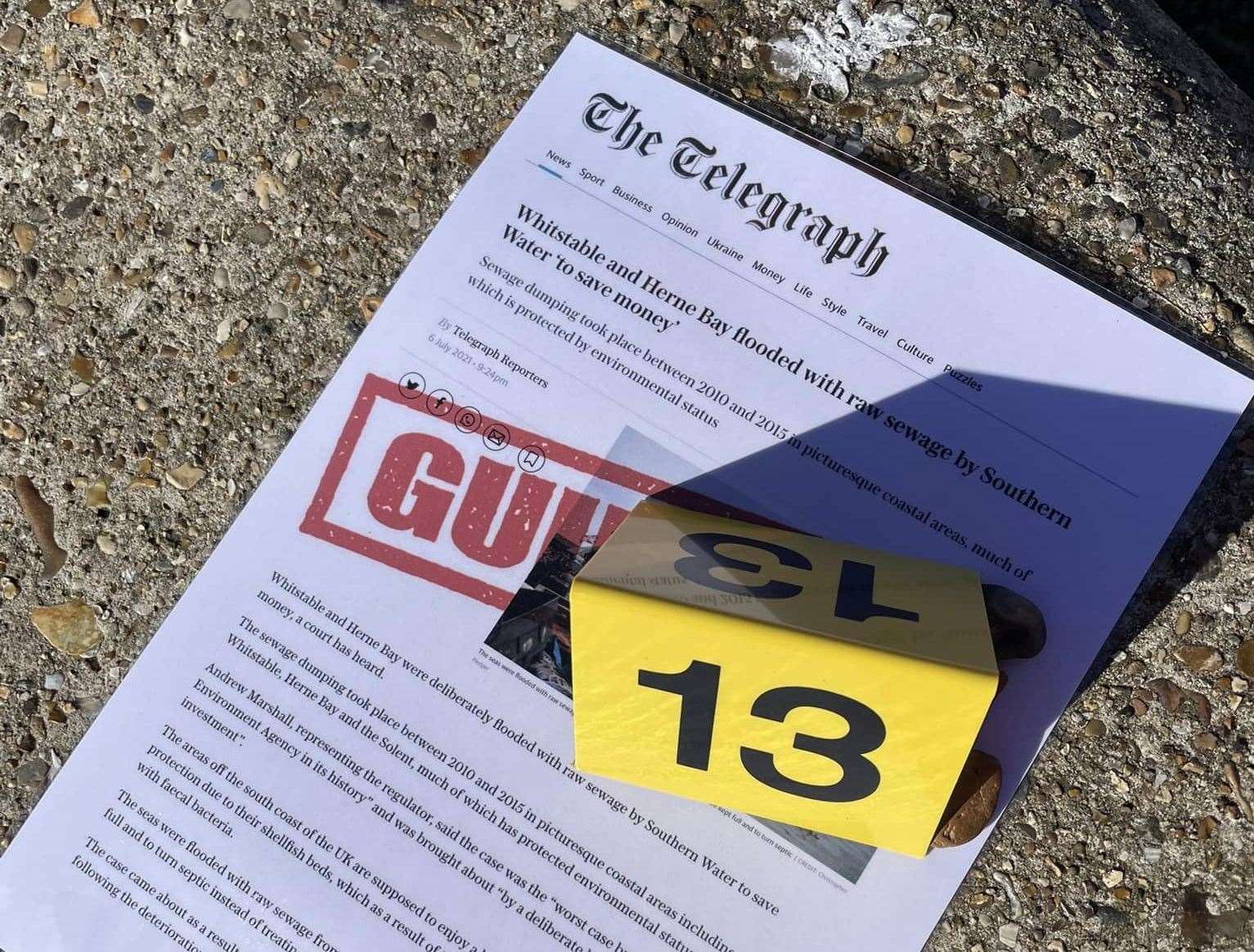 Activists dressed the beach as a crime scene, marking articles on Southern Water's crimes as evidence. Photo: SOS Whitstable