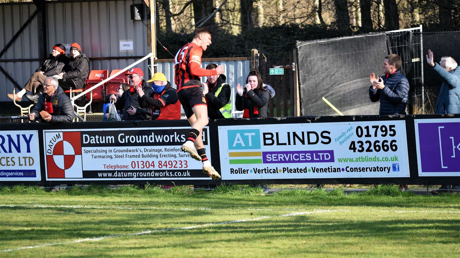 Toby Bancroft celebrates a goal against Ashford United Picture: Ken Medwyn