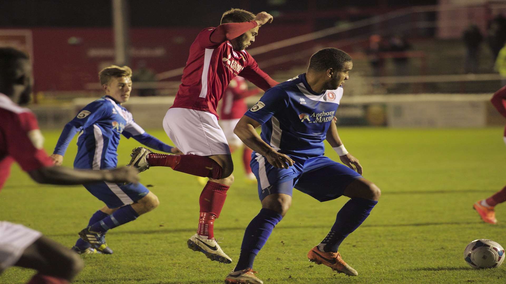 Matt Godden tries to get beyond Welling's Chris Bush Picture: Andy Payton