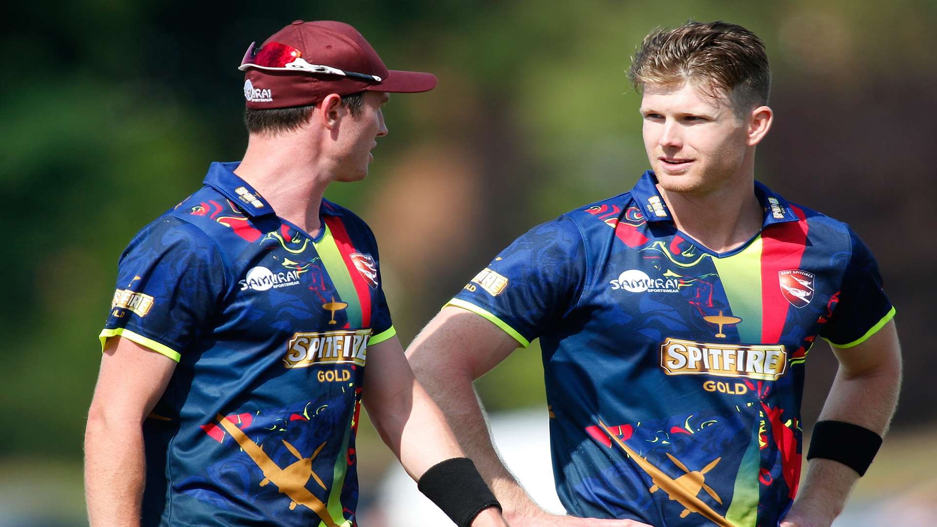 Kiwis Adam Milne, left, and Jimmy Neesham took five Surrey wickets between them Picture: Andy Jones