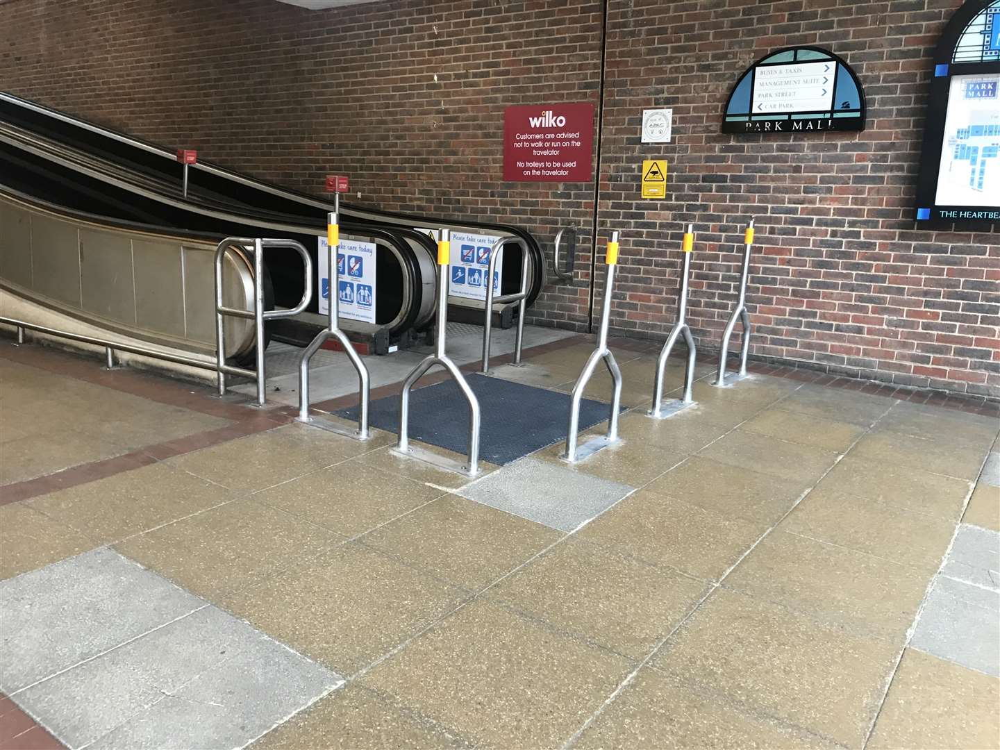 Barriers have been placed around the travelator