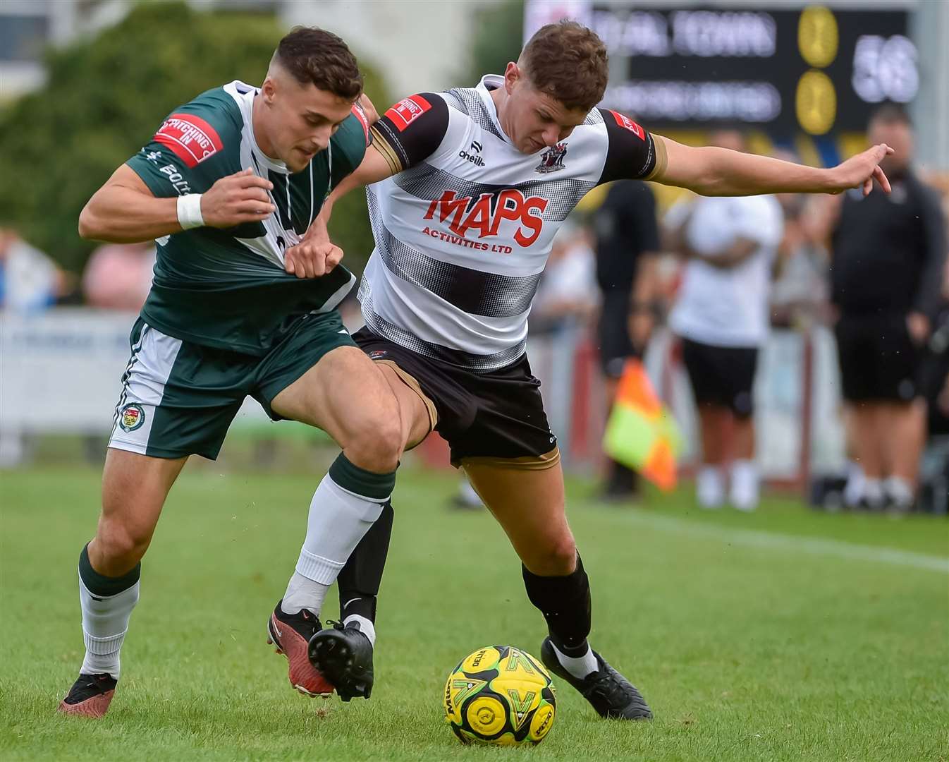 Deal (white) try to get to grips with Ashford in the FA Trophy first qualifying round. Picture: Ian Scammell