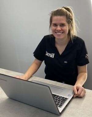 Receptionist Charlotte Williams at the new shopping centre surgery