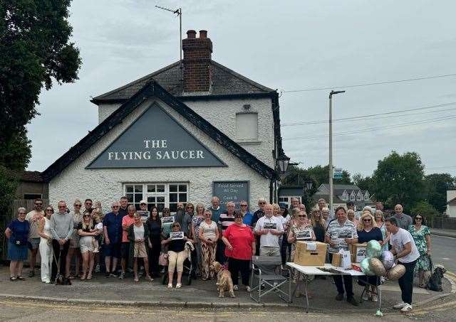 Save Our Pub - campaigners fighting to get The Flying Saucer in Hempstead reopened. Photo: Joshua Wood