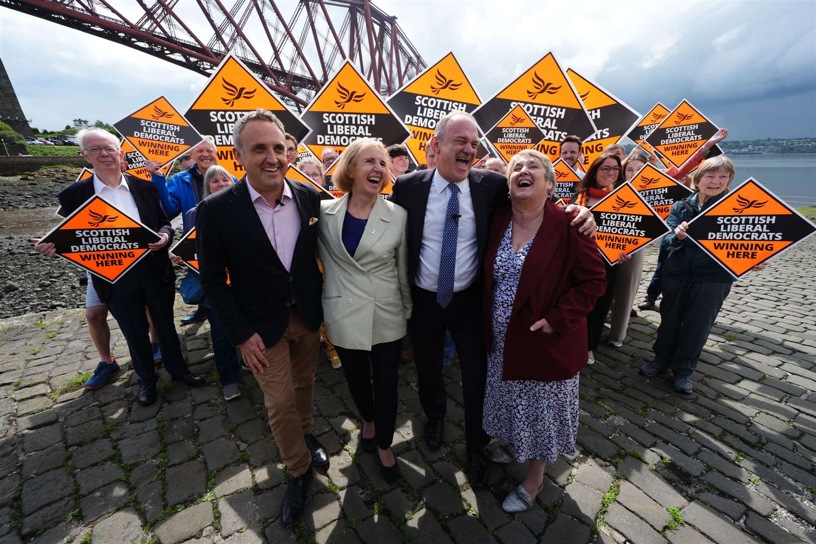 Susan Murray (second left) and Edinburgh West MP Christine Jardine (right) (Andrew Milligan/PA)