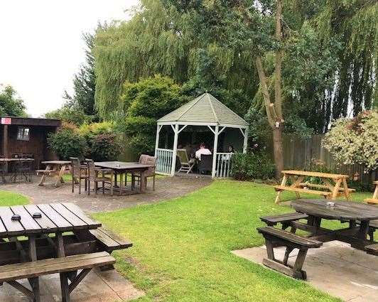 Some punters braved the rain to get to the gazebo