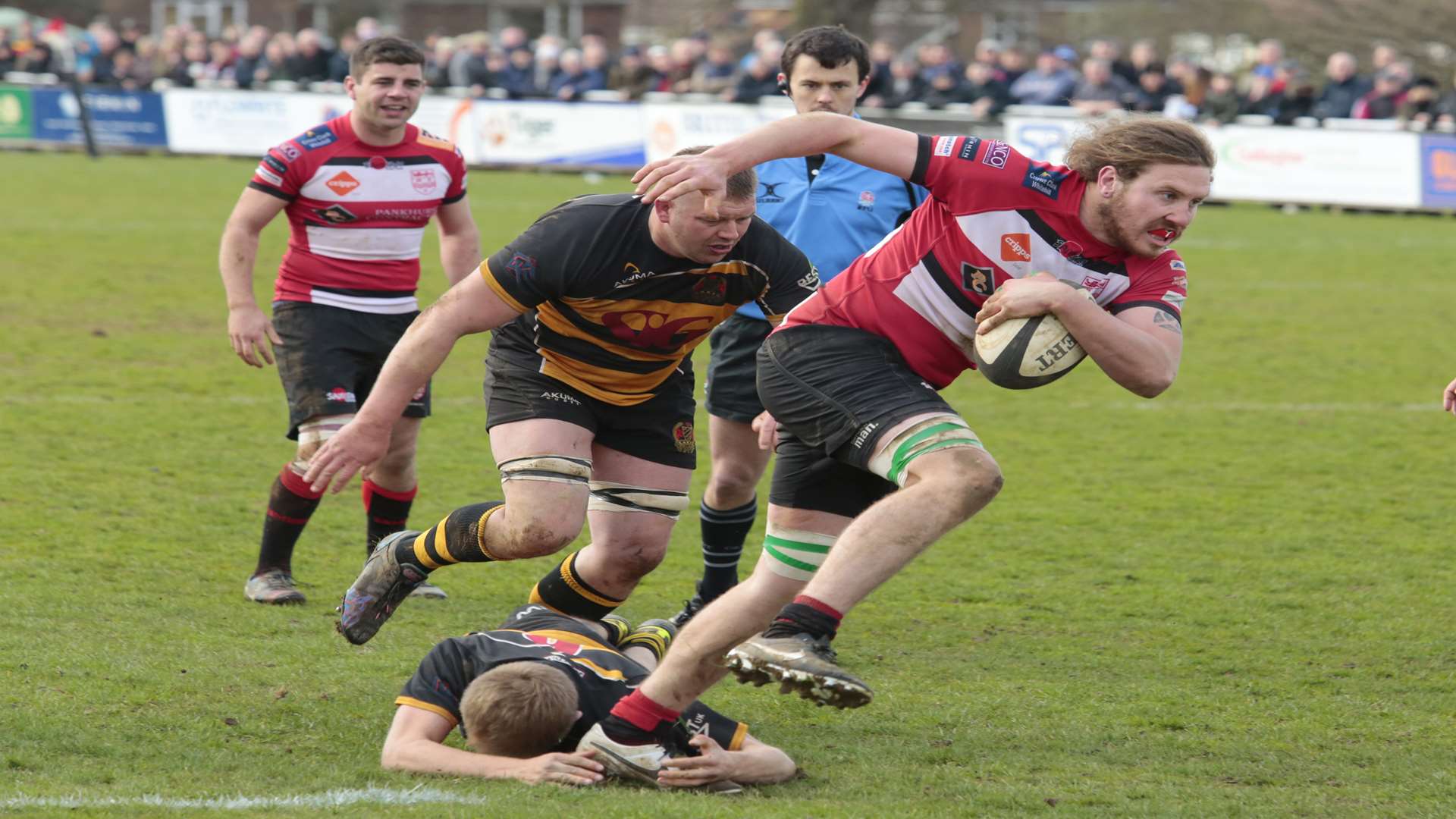 Maidstone's Ben Brill shakes off a Coney Hill tackle Picture: Martin Apps