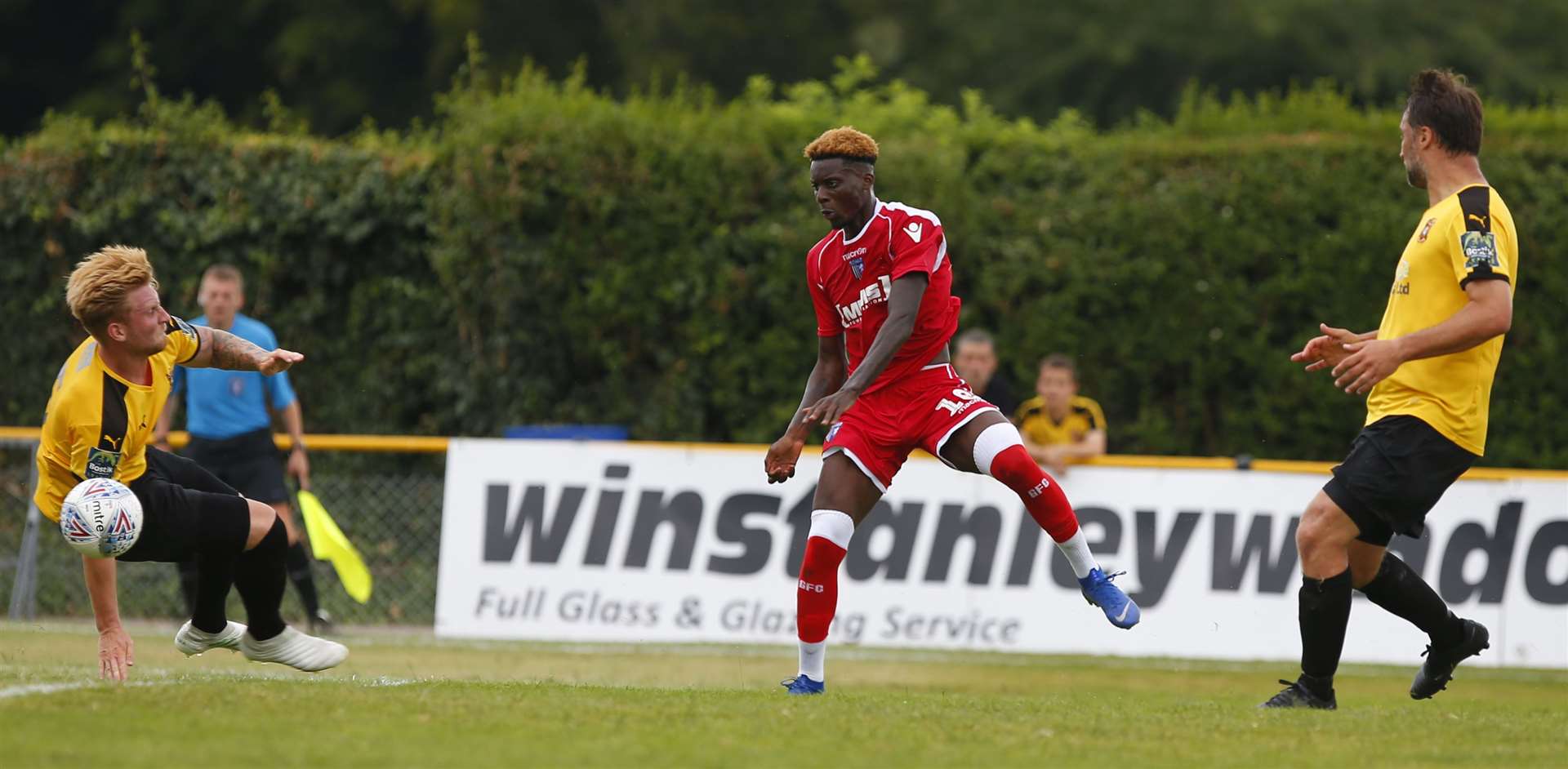 Mikael Ndjoli scores Gillingham's second goal against Folkestone. Picture: Andy Jones