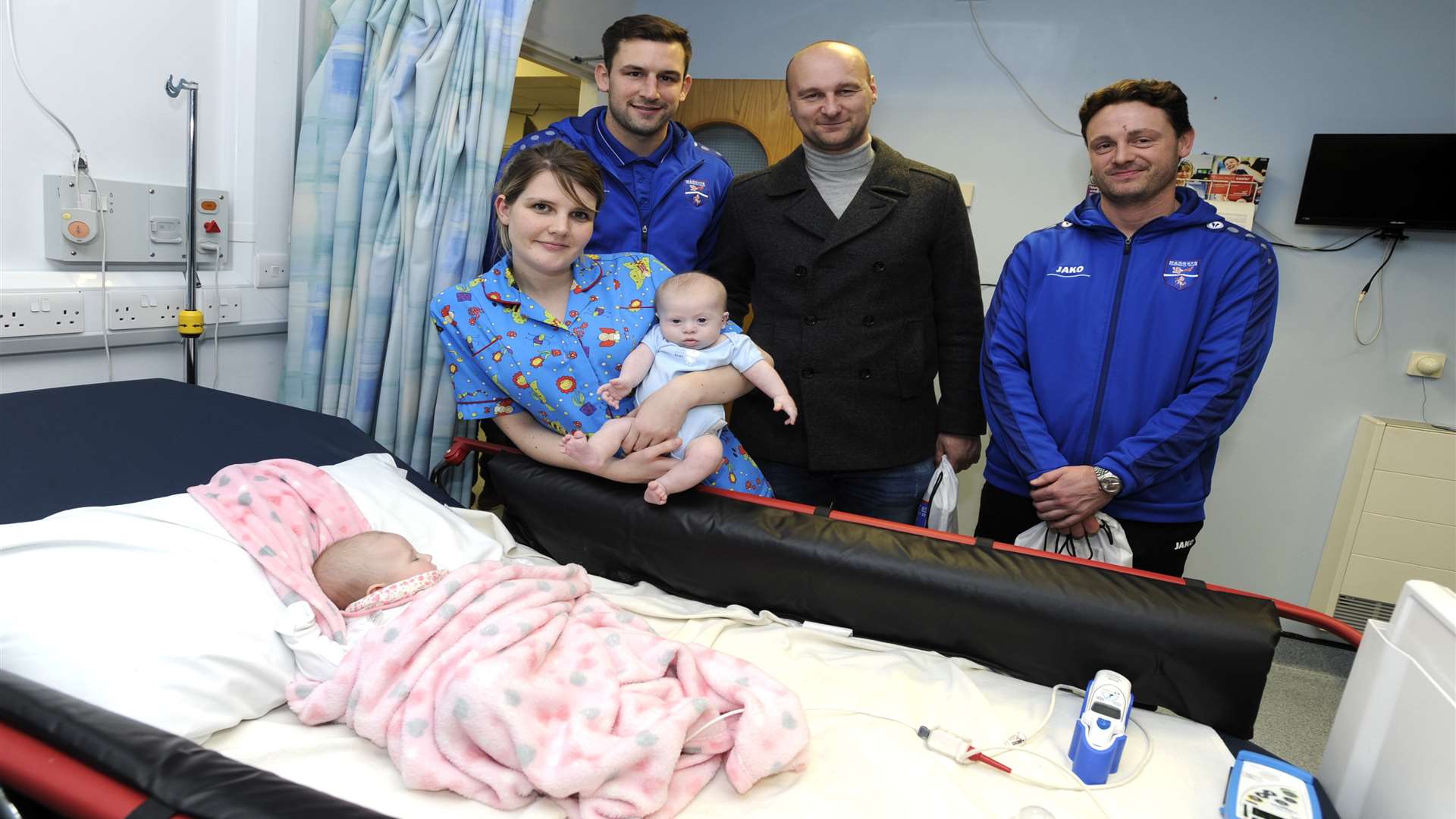 Margate manager Steve Watt, centre, and players Liam Friend and Frannie Collin visited