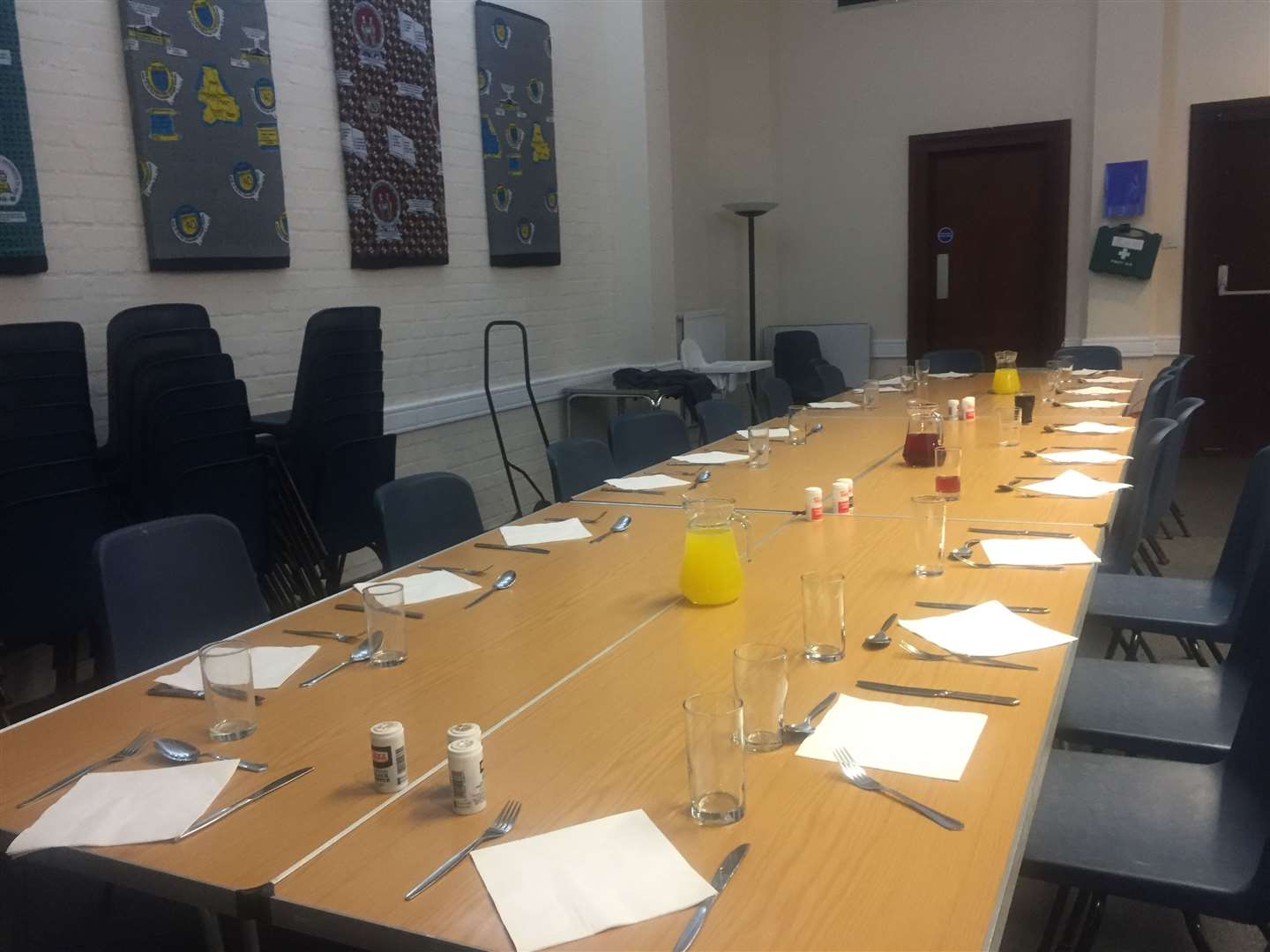 Guests, staff and volunteers eat together