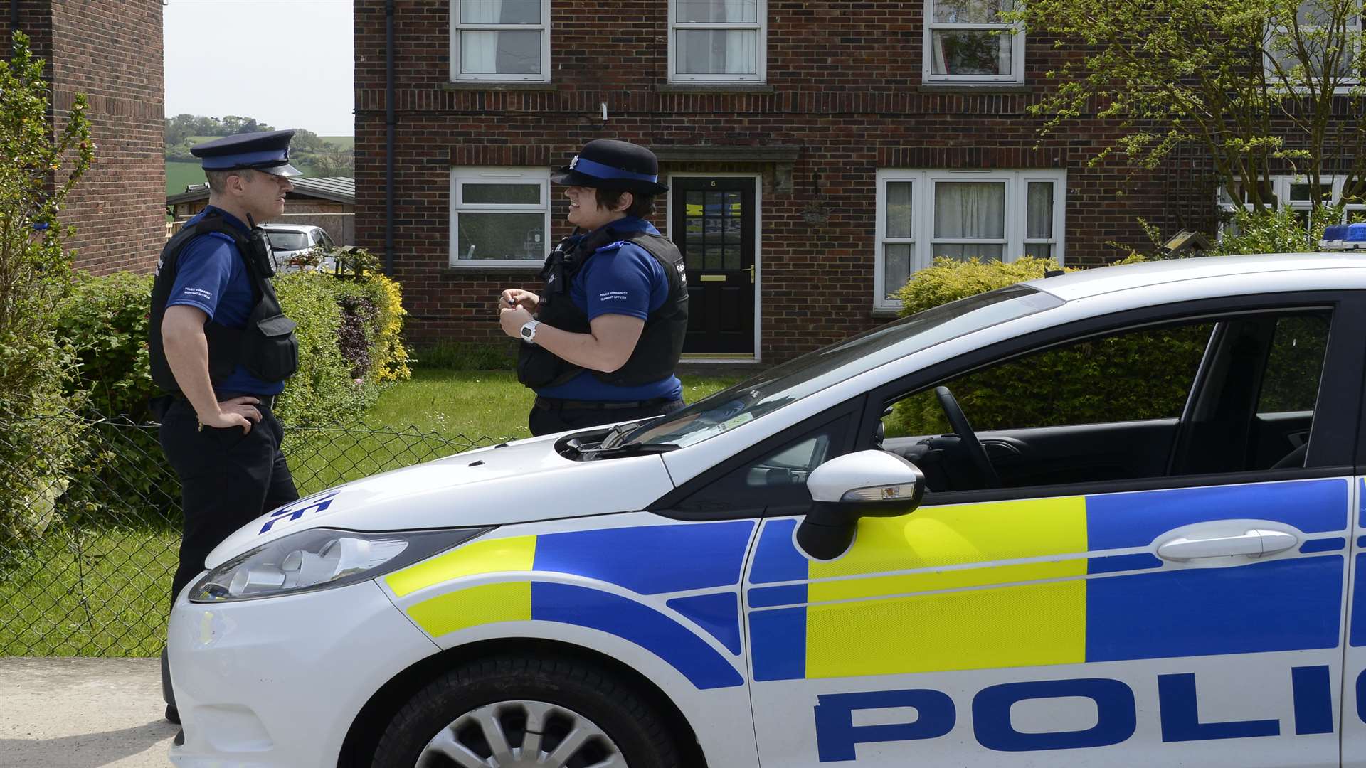 Police outside the home of Mariola Cudworth in Mill Lane, after her body was discovered. Picture: Paul Amos