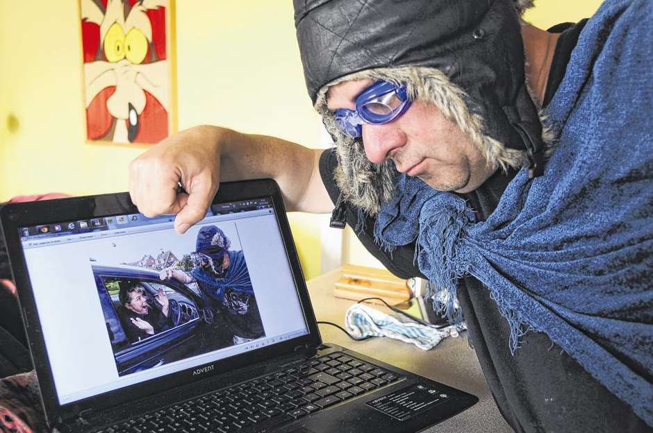 Parallel Parking Man watches his video guide to female drivers