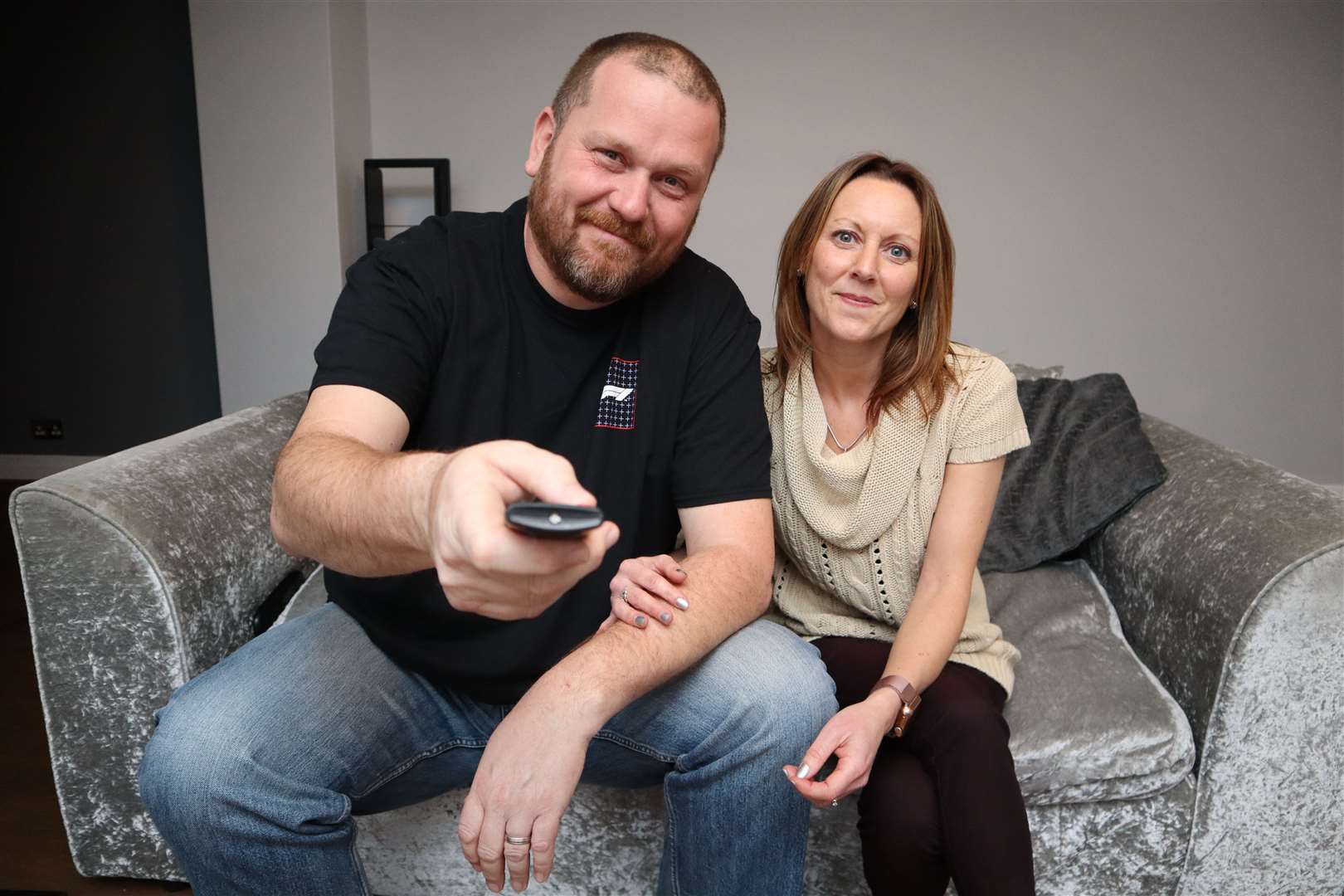 Mike and Sarah Fendt tuning in to watch Silent Witness after the BBC TV crew hired their home on The Leas at Minster to shoot scenes. Picture: John Nurden