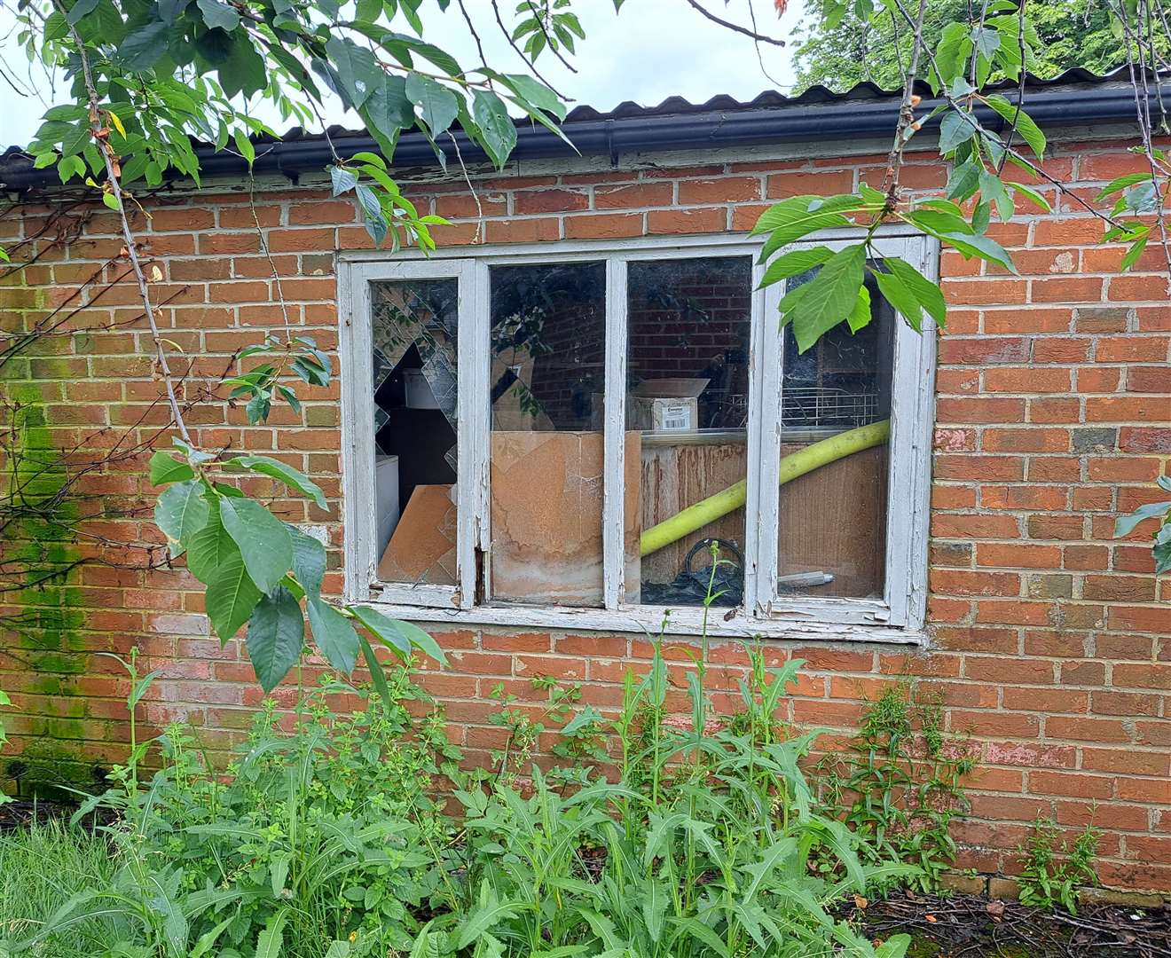 Vandals have smashed windows in the outbuildings at the Hadlow Manor Hotel