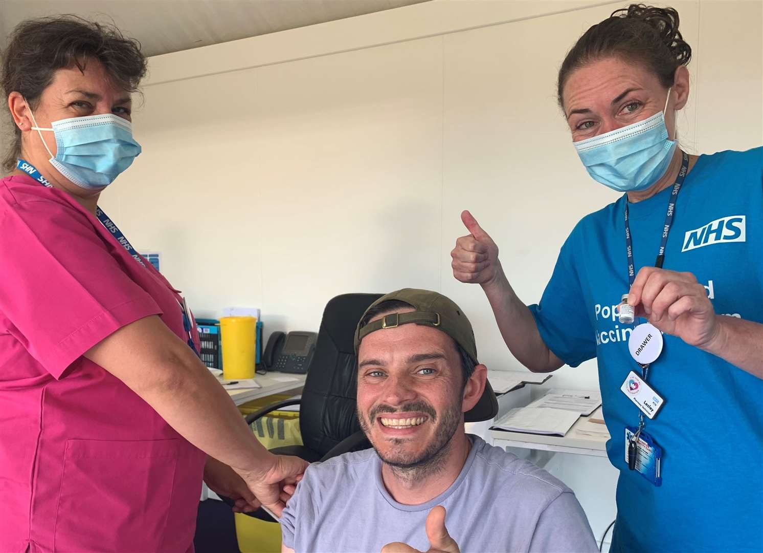 Phil Myers was the 1000th person to get a Covid jab at the pop-up vaccination centre at The Open in Sandwich