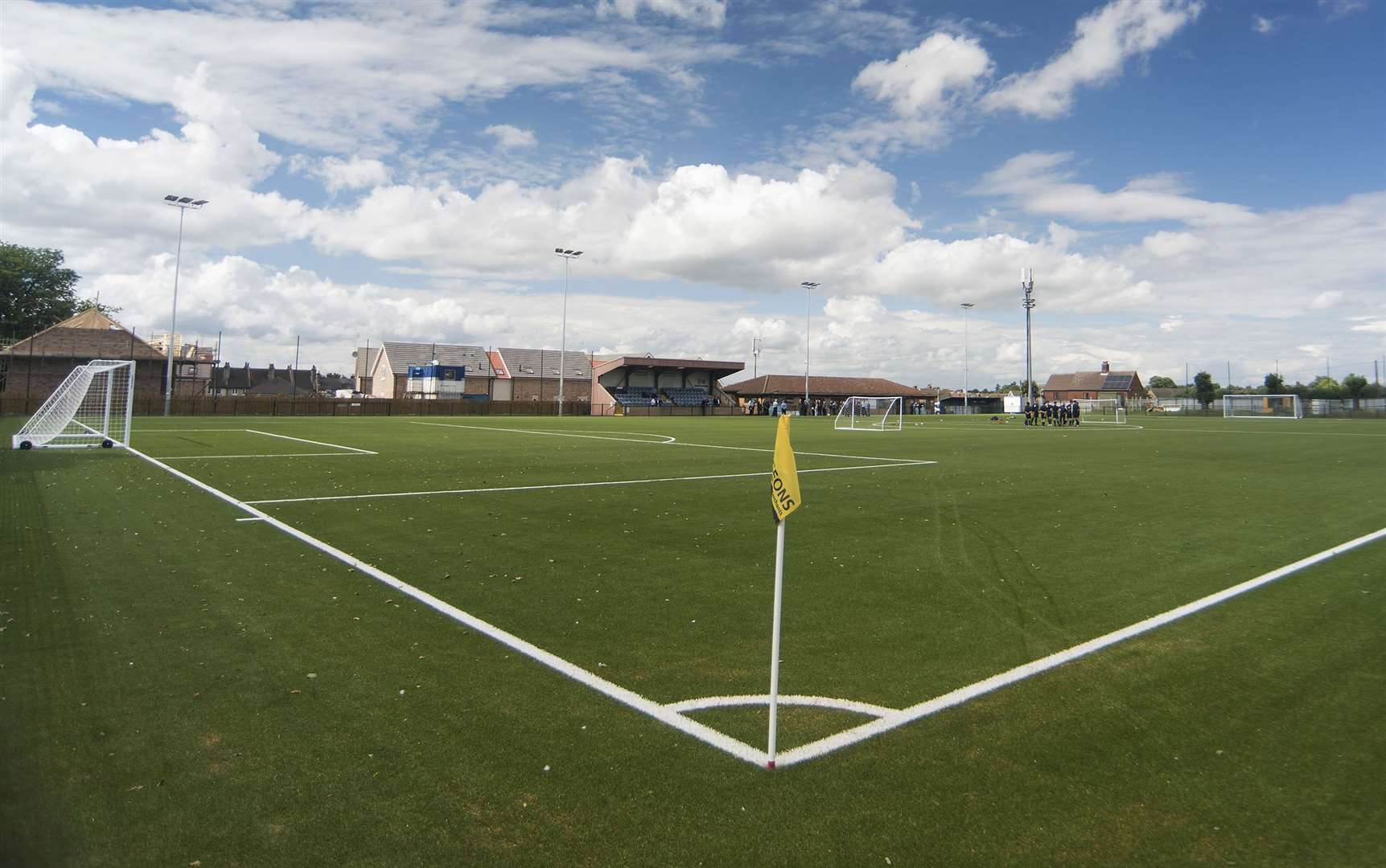 An artificial surface like this would allow the grounds in Herne Bay and Whitstable to be used in all weathers. Stock picture