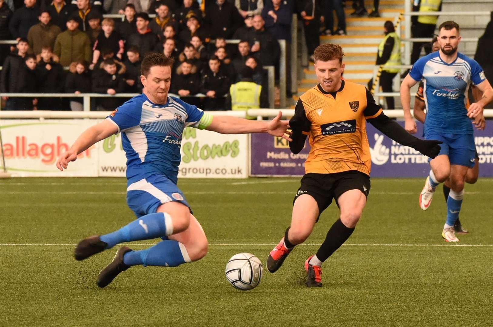 Tonbridge skipper Sonny Miles challenges Jack Barham Picture: Steve Terrell