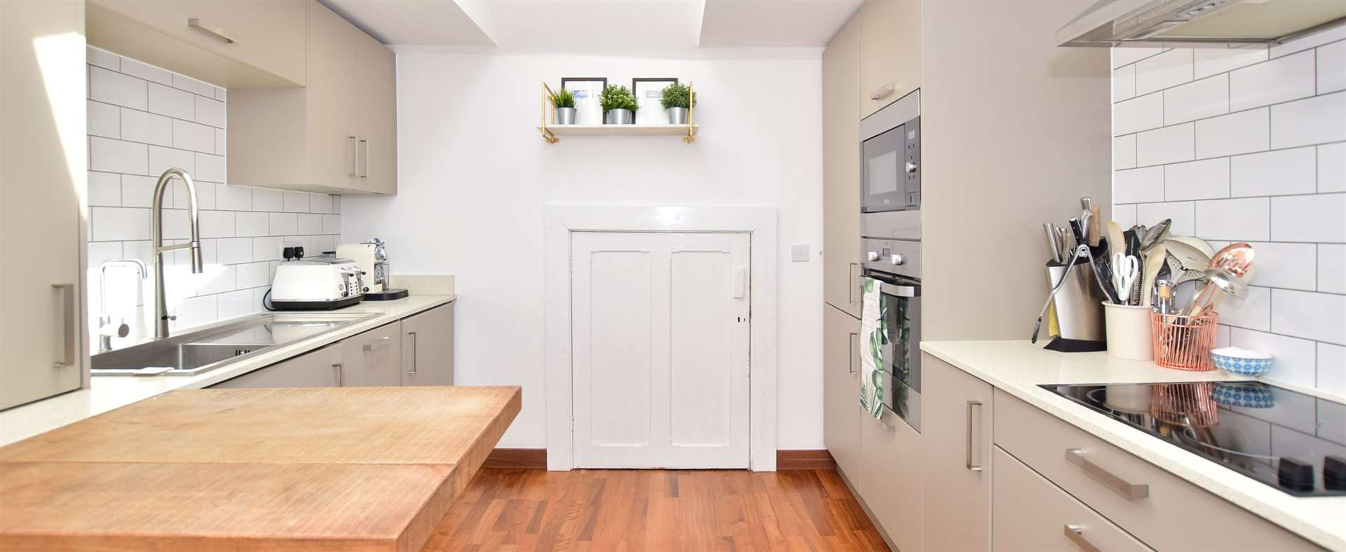 The kitchen has a contemporary finish