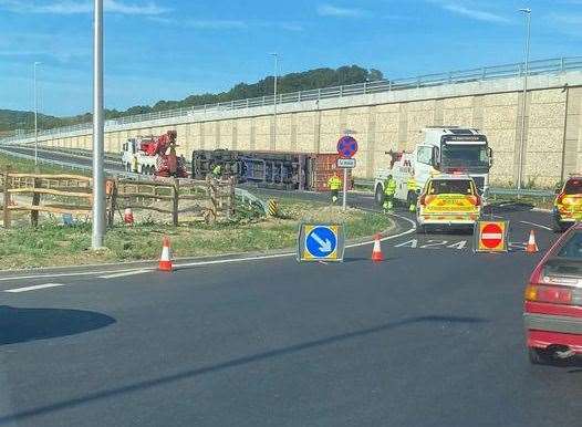 The overturned lorry on the slip road to the Maidstone-bound A249 at the Stockbury Roundabout. Picture: Terry Cox