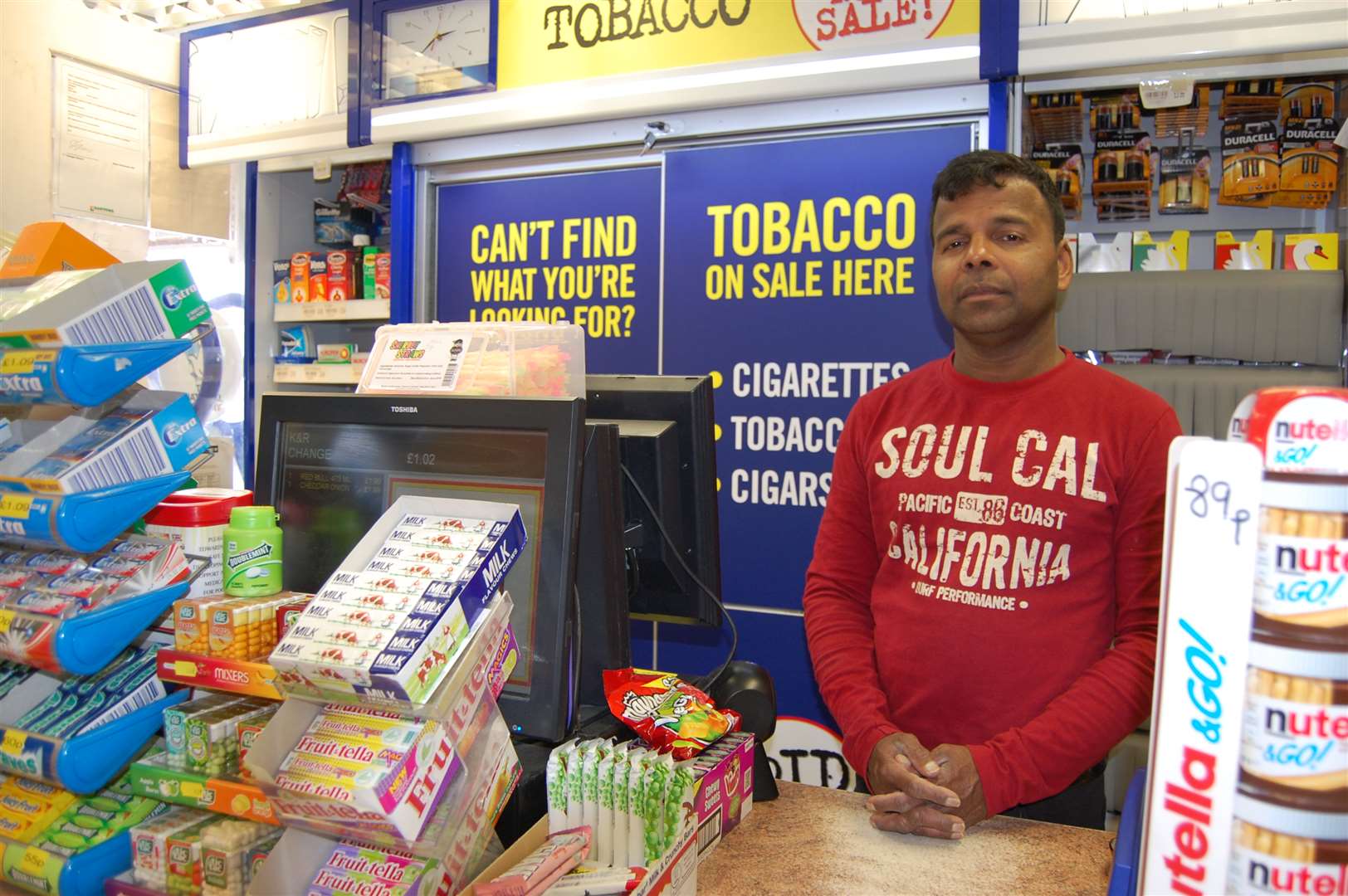 Kandasamy Sivanathan was forced to hand over hundreds of pounds from the shop's till.