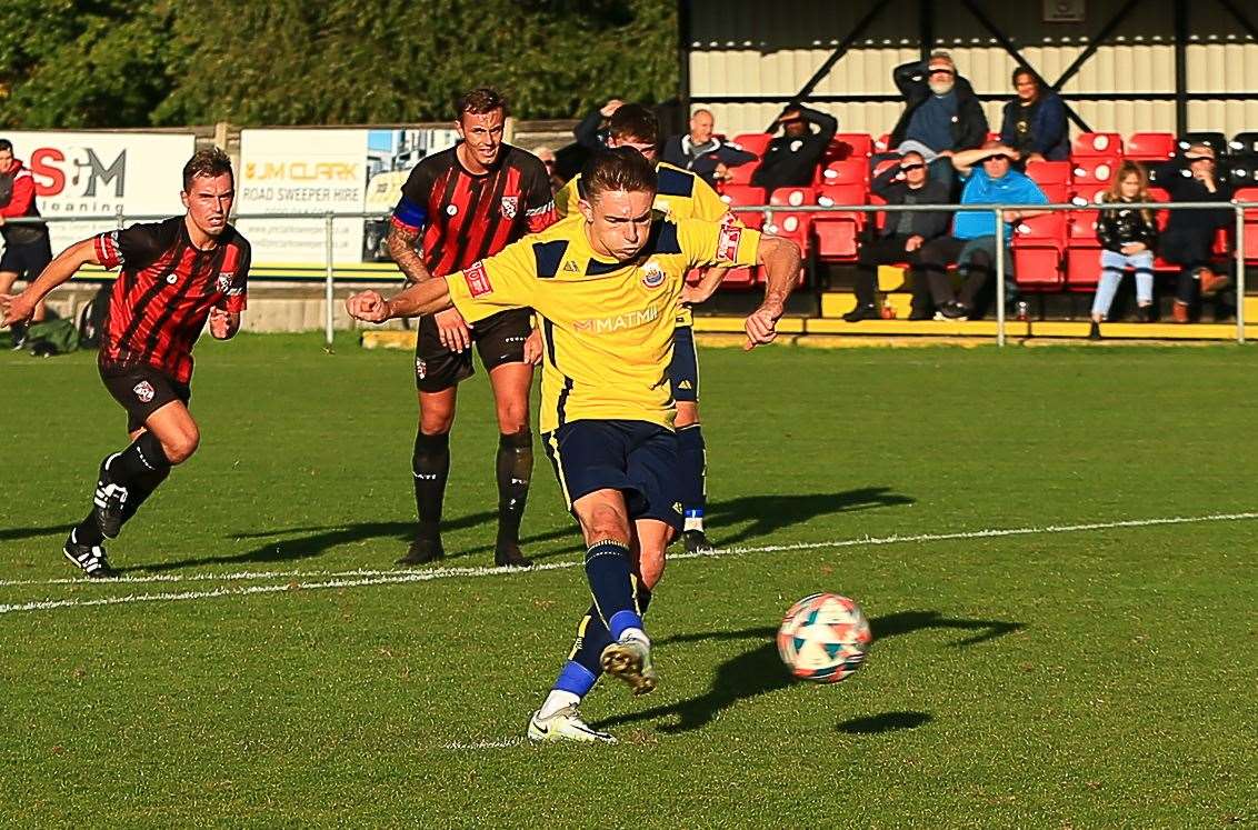 Josh Oliver scores his penalty. Picture: Les Biggs