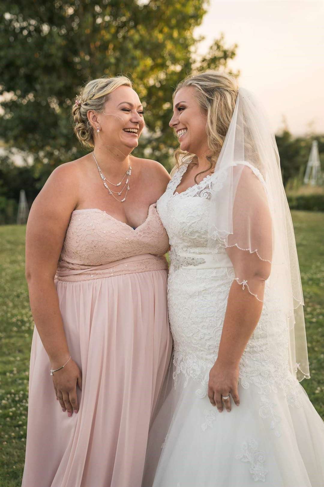 Bridesmaid Stephanie Osbourne, from Wilmington, Dartford, with bride Becky Symonds on her big day (8004236)