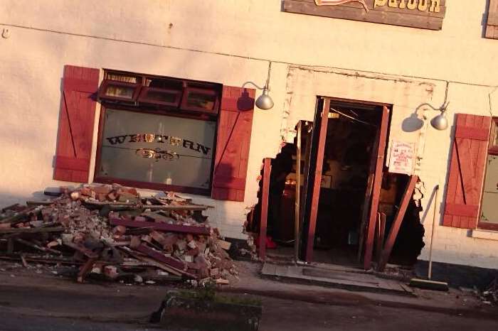 Rita Egan, 84, was sitting behind the door of the pub just one minute before the car ploughed through it