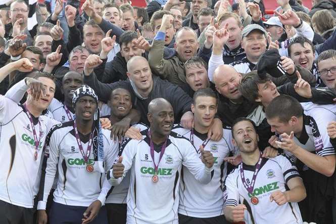 Dover's players celebrate with their fans. Picture: Andy Payton