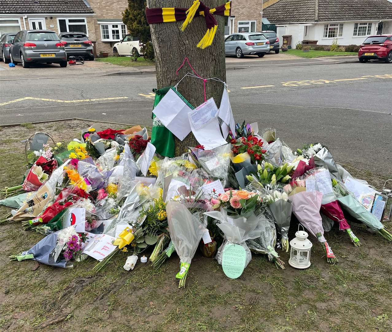 Flowers left in memory of teacher Ben Allen